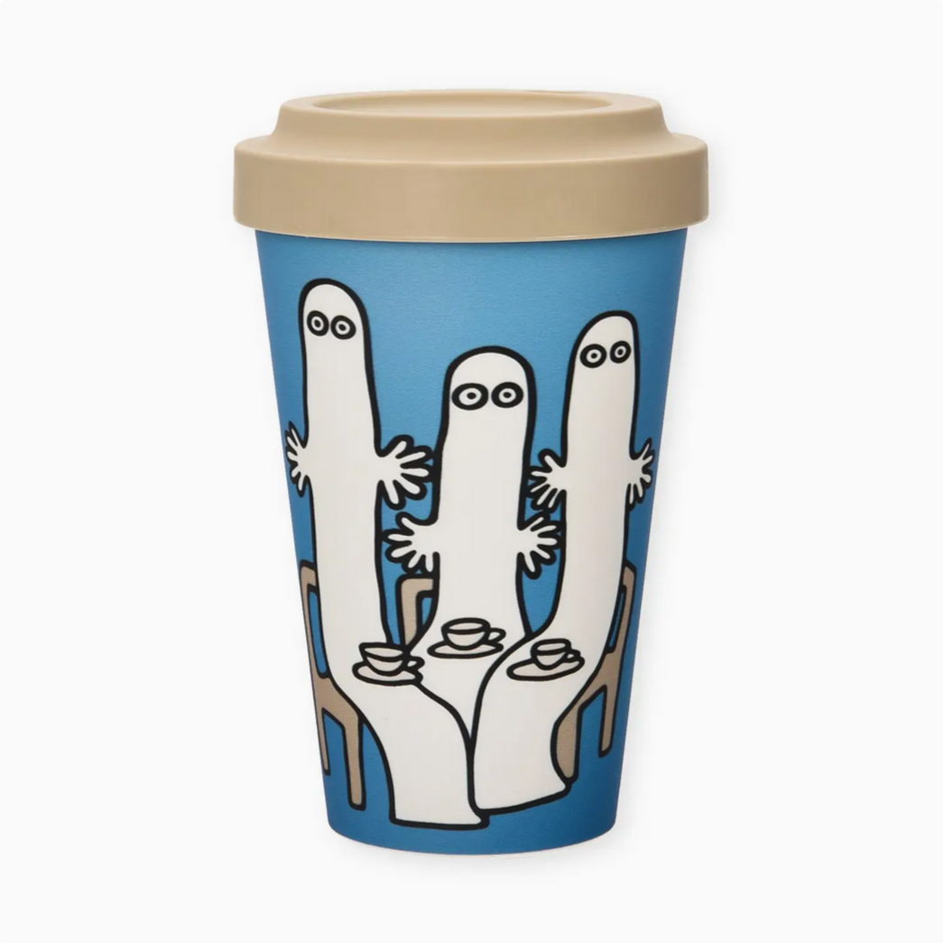 Blue travel mug with beige lid featuring a white cartoon, Moomin design on a white background