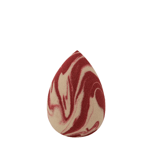 A teardrop-shaped makeup sponge with a red and white marbled pattern. Beautiful to display and when using it makes your skin effortless and smooth.