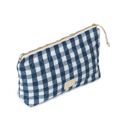 Measuring 9" x 6" x 2",&nbsp;the Nola toiletry bag is a timelessly cool quilted bag perfect for keeping your belongings in one place: makeup, stationery, electronics, or whatever you decide. The Nola bag is as practical as it is sustainable, and as stylish as it is versatile.
