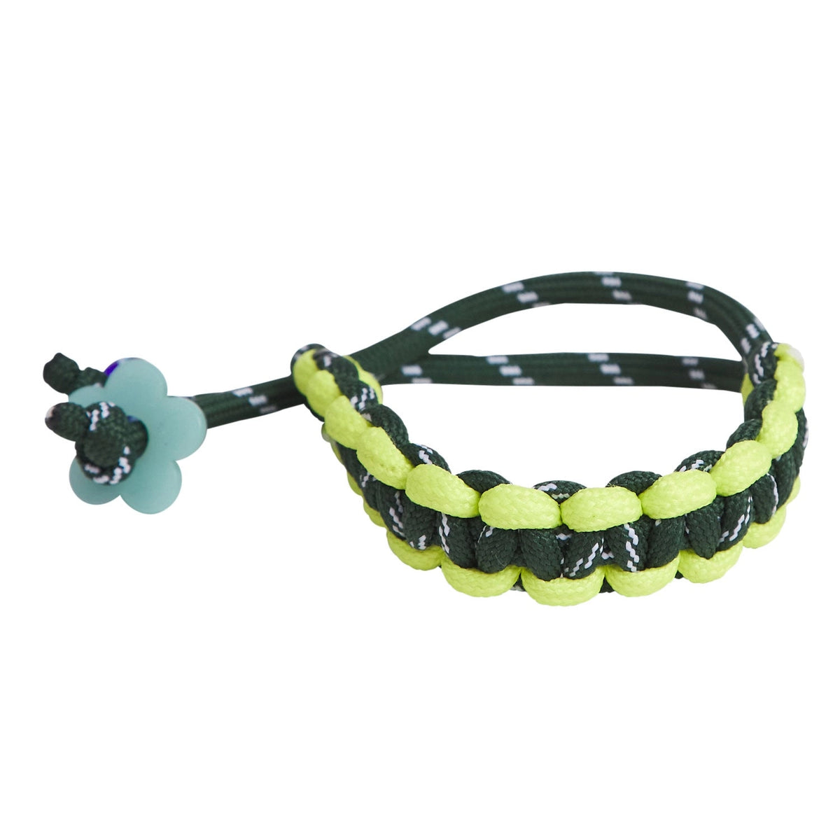 Neon green and black braided bracelet with a small flower charm on a white background