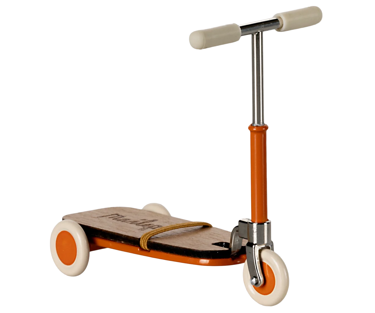 Children's scooter with wooden deck and orange accents on a white background