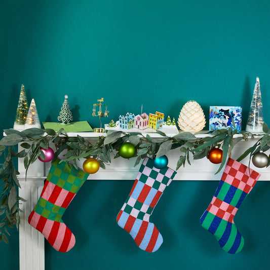 Decorative frosted glass pinecone light that uses batteries and lights up for a beautiful cozy ambiance in any space. Perfect for the holiday season and placing on a tablescape or on a mantel. 