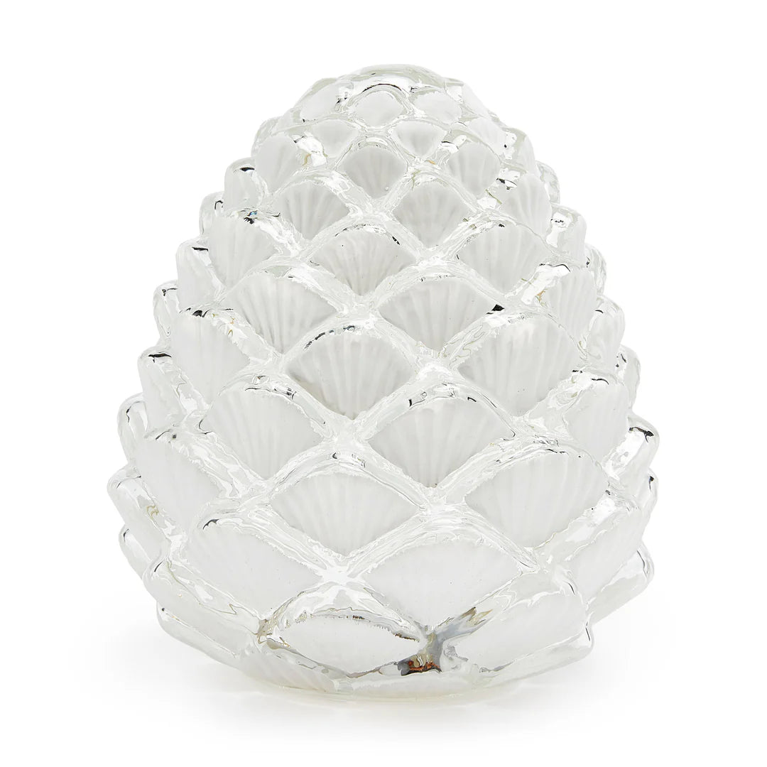 Decorative frosted glass pinecone light that uses batteries and lights up for a beautiful cozy ambiance in any space. Perfect for the holiday season and placing on a tablescape or on a mantel. 