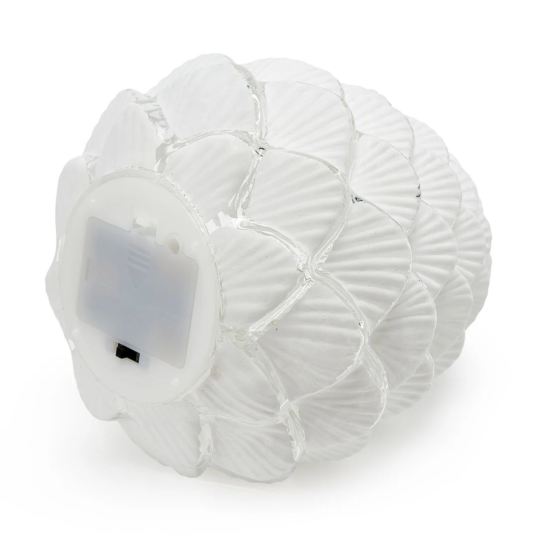 Decorative frosted glass pinecone light that uses batteries and lights up for a beautiful cozy ambiance in any space. Perfect for the holiday season and placing on a tablescape or on a mantel. 