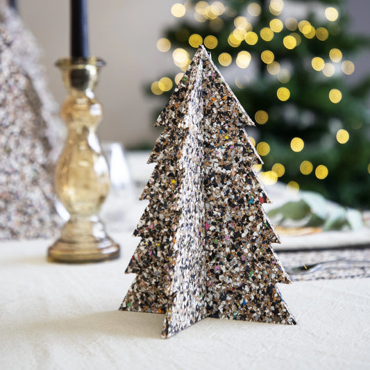 Add a sustainable touch to your festive decor with this Cork Tree Decoration, available in Medium and Large sizes. Made from eco-friendly material—a durable blend of cork and recycled EVA plastic—this flat-pack tabletop tree is easy to assemble and perfect for stylish, responsible holiday decorating.