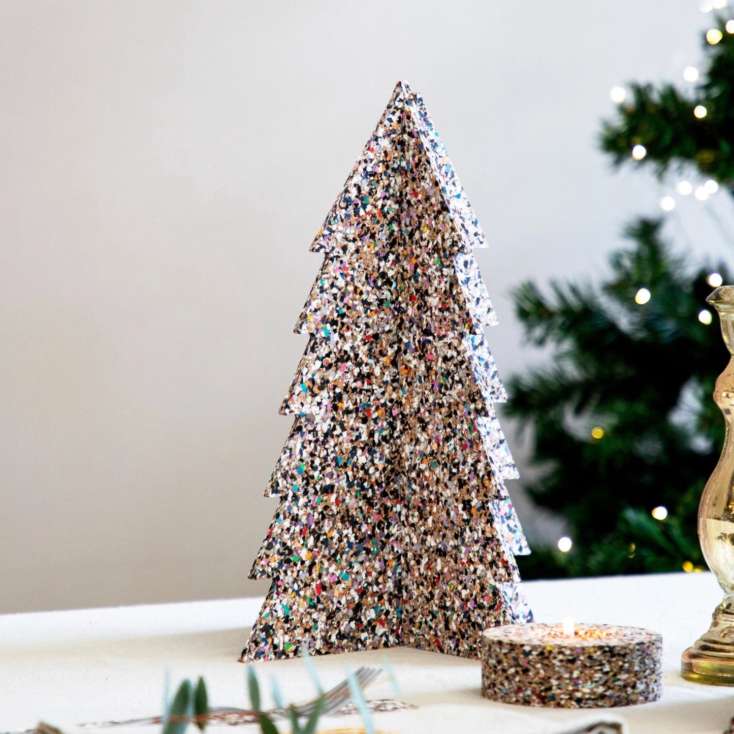 This decor will impress because it is not your ordinary decor. Looks amazing because it is natural cork. It helps with providing that holiday cheer but for a beautiful touch. Scandinavian decor from Huset Shop, Abbot Kinney in Venice California. Eco- Friendly Holiday decor.