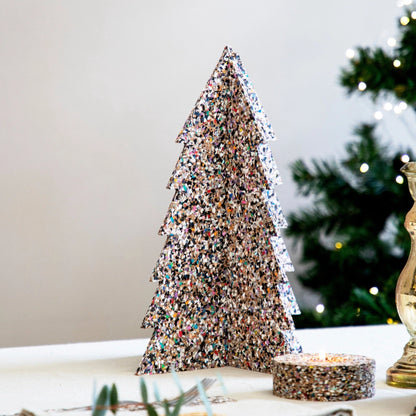 This decor will impress because it is not your ordinary decor. Looks amazing because it is natural cork. It helps with providing that holiday cheer but for a beautiful touch. Scandinavian decor from Huset Shop, Abbot Kinney in Venice California. Eco- Friendly Holiday decor.