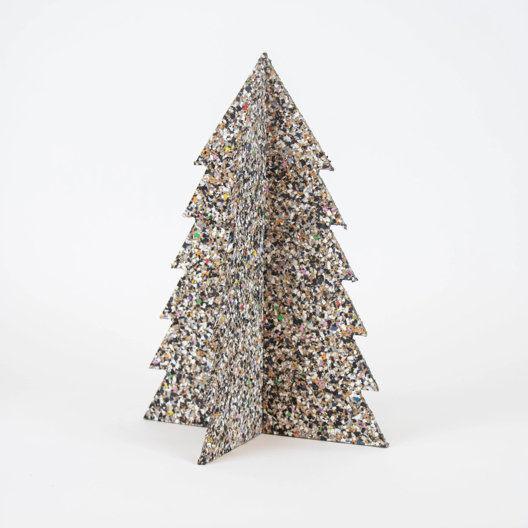 This decor will impress because it is not your ordinary decor. Looks amazing because it is natural cork. It helps with providing that holiday cheer but for a beautiful touch. Scandinavian decor from Huset Shop, Abbot Kinney in Venice California. Eco- Friendly Holiday decor.