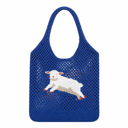 A blue crochet mesh tote bag featuring a white, beige, and orange embroidered lamb design in the center, shown against a plain white background.