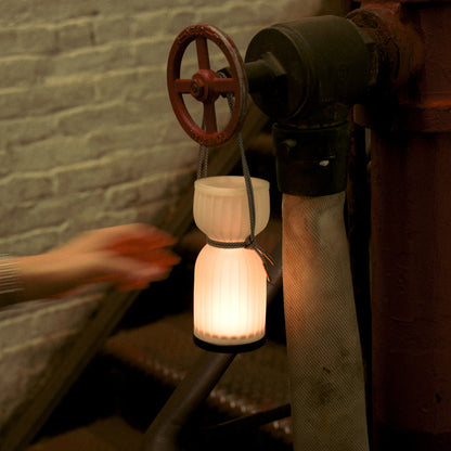 Initially inspired by the shape of water gourds and sake bottles, the Camp Lantern features a playful paracord sling handle, meant to encourage and highlight portability – hang it on a bedpost, take it on a picnic, or simply carry it with you around the house.&nbsp;
Cordless unit is USB-C rechargeable, features three dim-to-warm brightness settings, and lasts for up to 80 hours between charges.