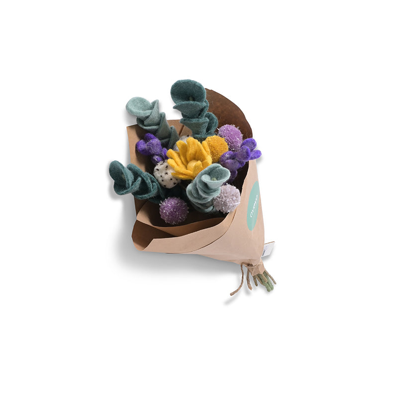 Aveva Wool Flower Bouquets that spark joy and will last you a lifetime. No more having to re buy flowers to fill the empty vases around your home, you can bring a touch of nature inside with colorful bouquets made with sustainable wool. This is the Limhamn bouquet with cool tones and a pop of yellow to create a focal point.