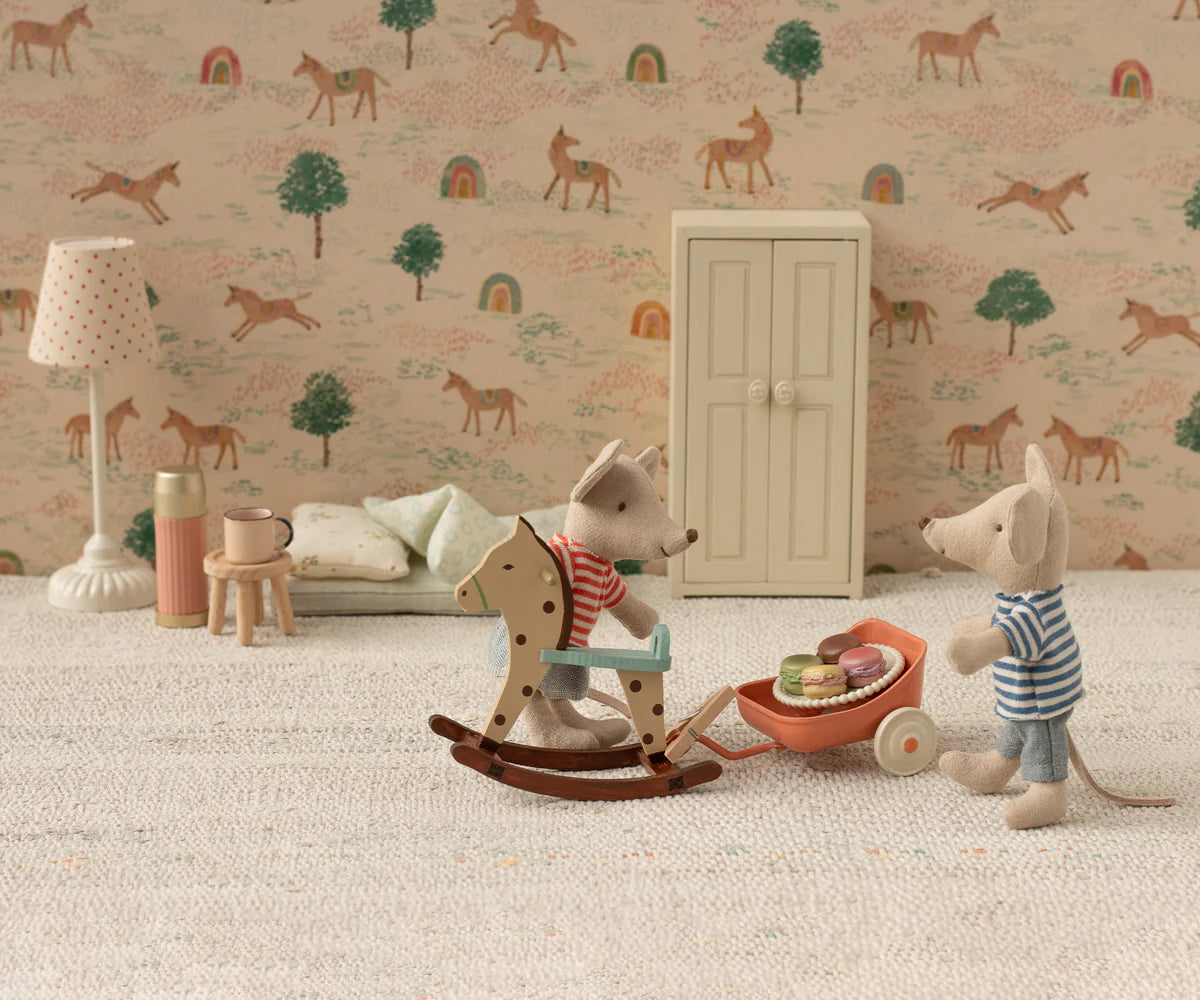 Meet little brother mouse LouiMax and his sister Stella. Both wear cosy striped shirts and love spending time together in the SuitCasa, always ready for endless playful adventures. With their magnetic paws, these siblings can hold on tight to metal toys, as well as each other. They come packaged together in a mini cardboard house, making them a delightful gift and a charming collectible.