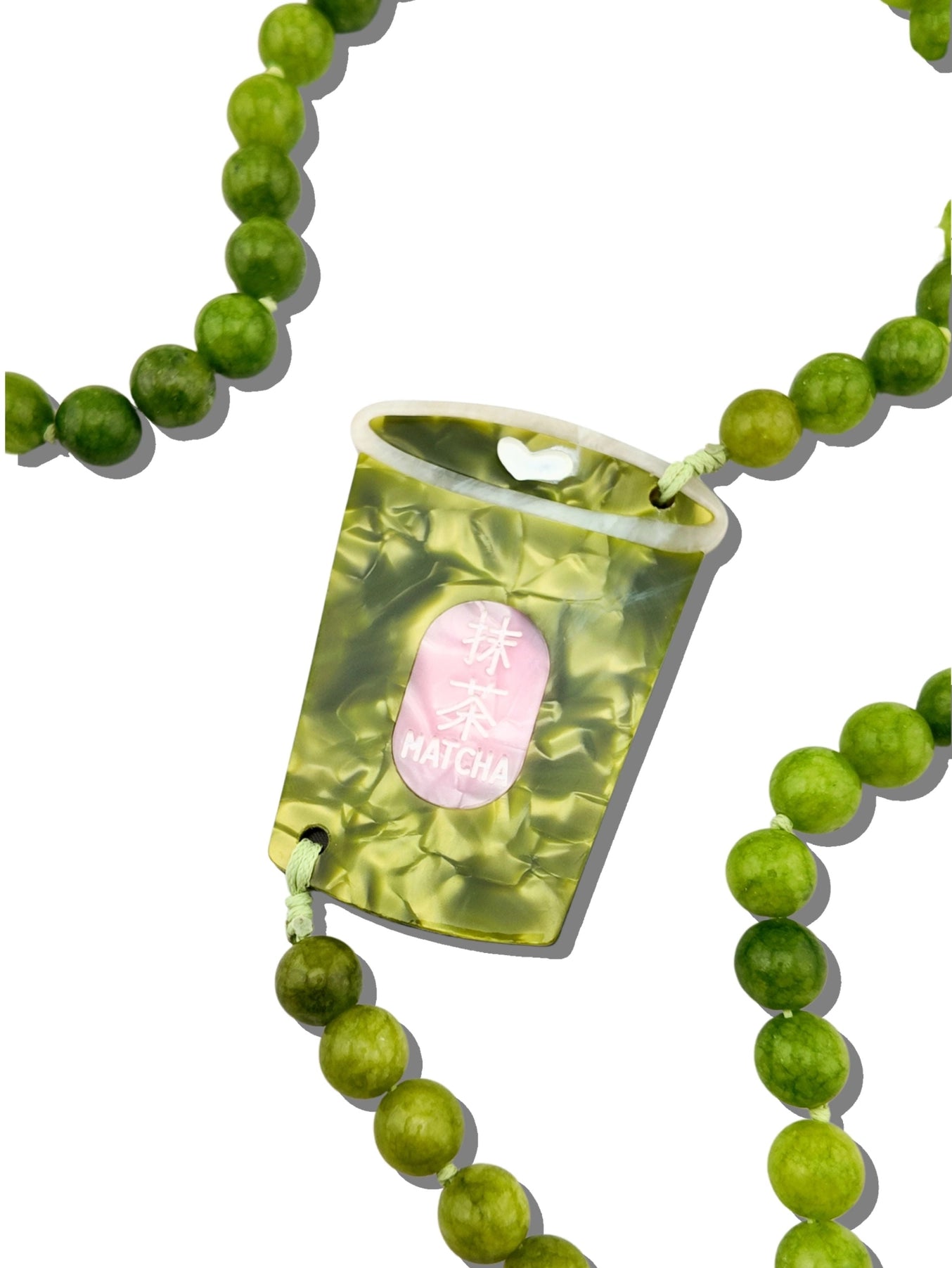 Crafted in small batches and finished with a signature hand-painted charm, this functional accessory is made to fit seamlessly into your day—whether you're running errands, heading out, or just keeping things light.