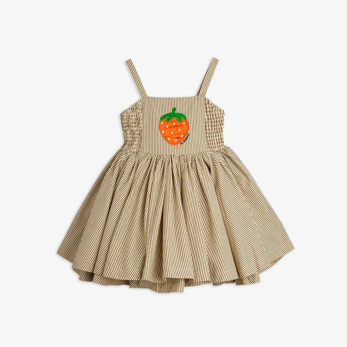 A toddler girl's sleeveless dress with thin shoulder straps, featuring a smocked bodice, a flared gathered skirt, and an orange strawberry applique on the chest, shown against a plain light gray background.