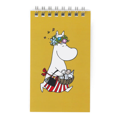 Notebook with a cartoon character on a yellow background