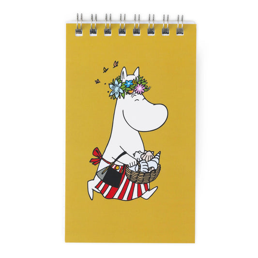 Notebook with a cartoon character on a yellow background
