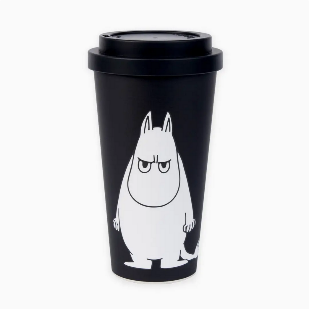 Black travel mug with a white cartoon character on a white background