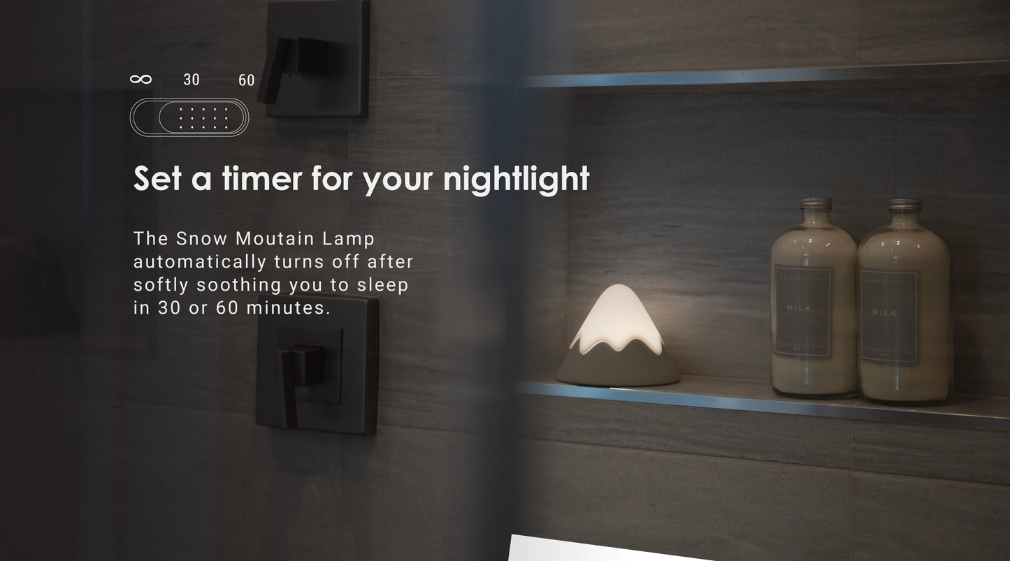 Mountain lamp in bathroom with gray tile cozy vibes