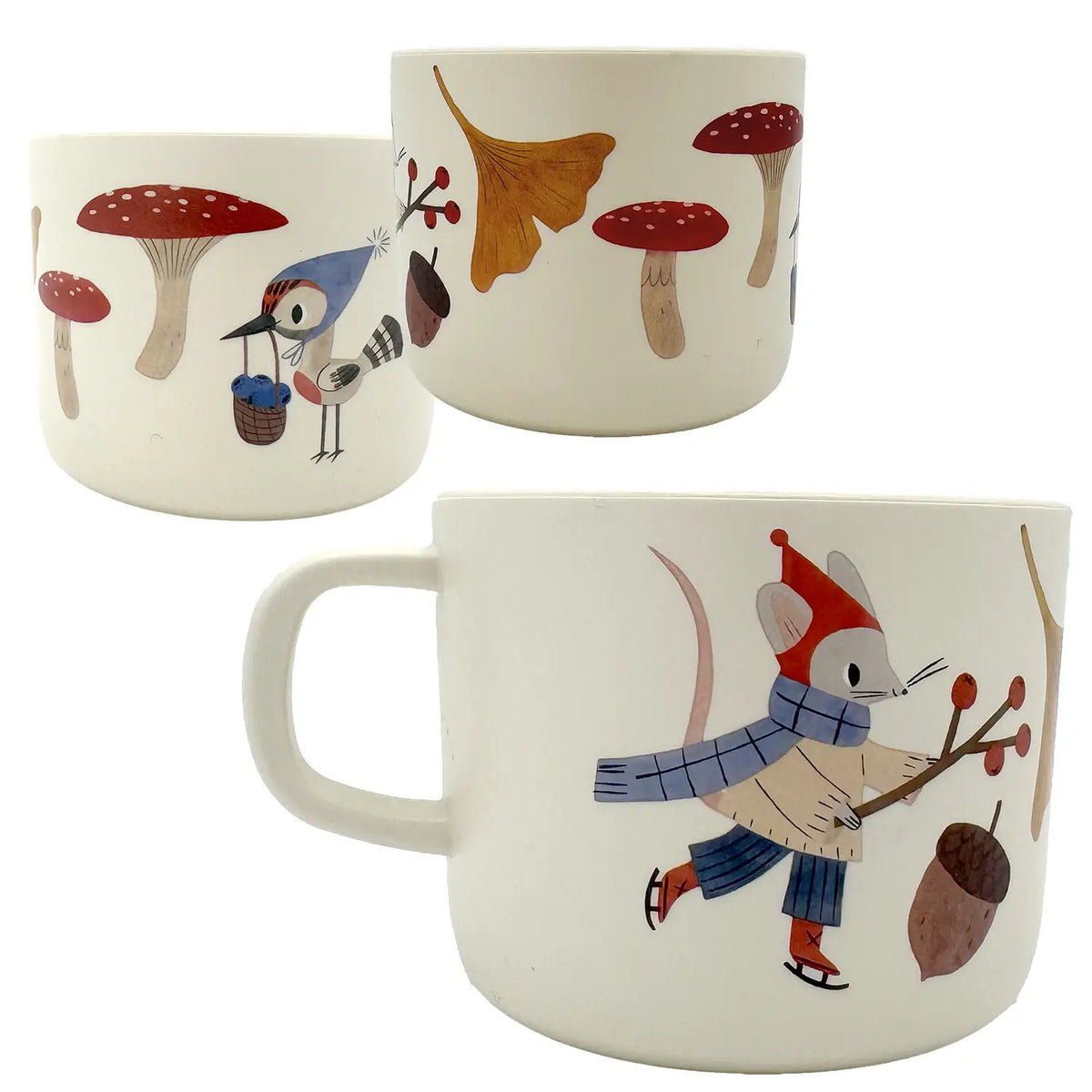 Three ceramic mugs with forest-themed illustrations on a white background