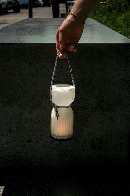 Initially inspired by the shape of water gourds and sake bottles, the Camp Lantern features a playful paracord sling handle, meant to encourage and highlight portability – hang it on a bedpost, take it on a picnic, or simply carry it with you around the house.&nbsp;
Cordless unit is USB-C rechargeable, features three dim-to-warm brightness settings, and lasts for up to 80 hours between charges.