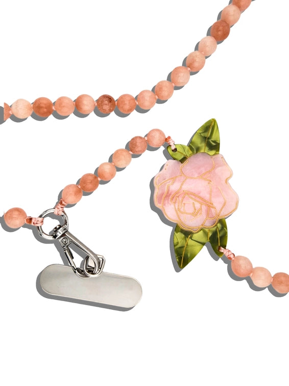 Crafted in small batches and finished with a signature hand-painted charm, this functional accessory is made to fit seamlessly into your day—whether you're running errands, heading out, or just keeping things light.