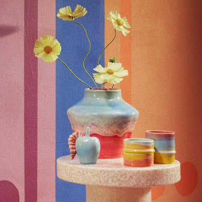 An absolute must-have for a playful yet practical home, this lovely mug is the perfect embodiment of KIMPOP's creative identity and Kähler's ceramic heritage. Perfect for hot or cold beverages, this mug makes the ideal gift for many occasions. Poppery is an excitingly vibrant collection by Kähler and KIMPOP, a Danish design duo comprising Sofie Linde and Joakim Ingversen, two exceptionally exuberant and creative characters in Danish pop culture. The collection is a shift from Scandinavian design norms throu