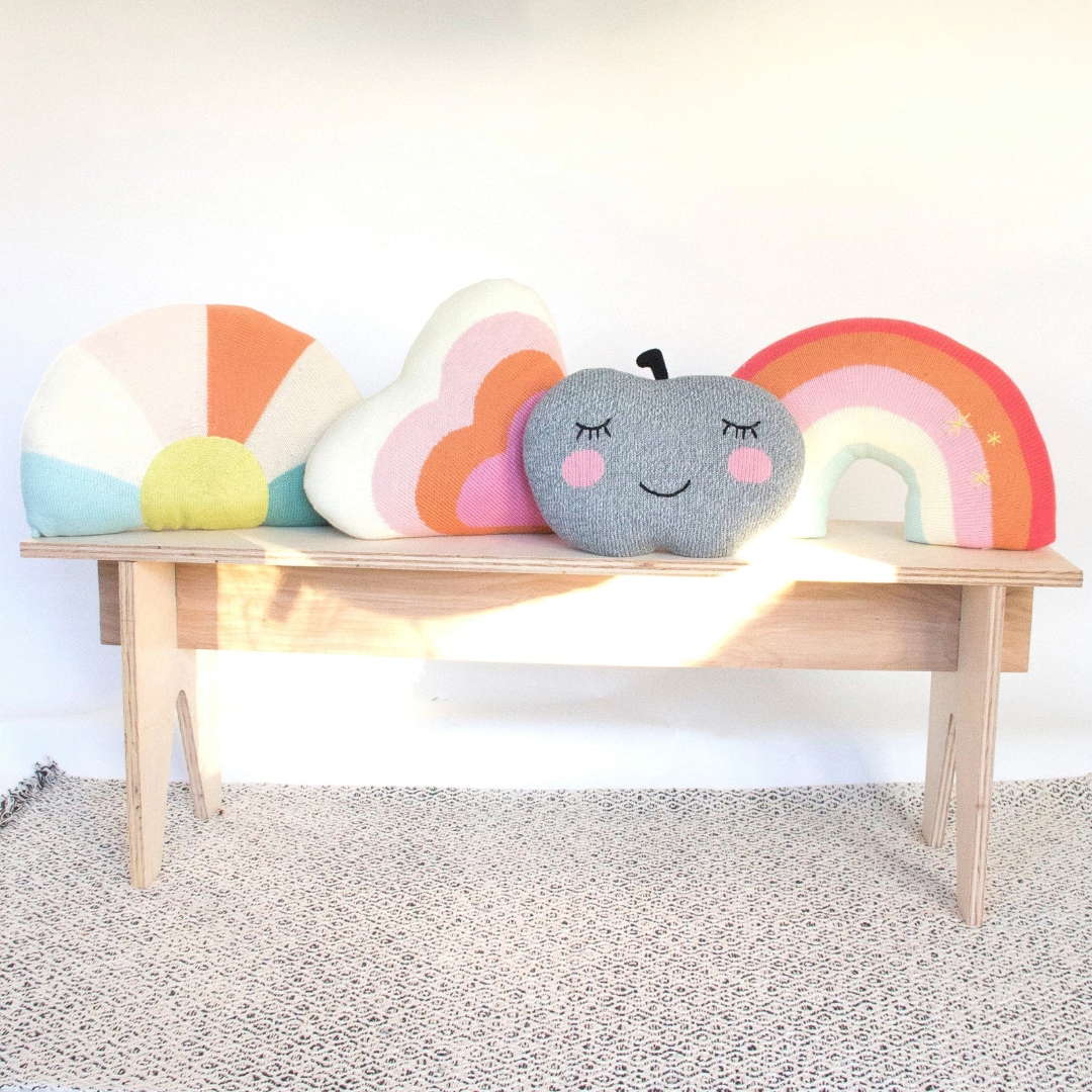 Comfy, colorful, stylish and made of sustainable cotton knit, so it is good for throwing around some color and happiness. One of Blabla's best-sellers! Bright pinks and oranges, inviting textures, a stylish addition to any kid's room. Who wouldn't want to hug a rainbow! Good luck guaranteed!&nbsp;