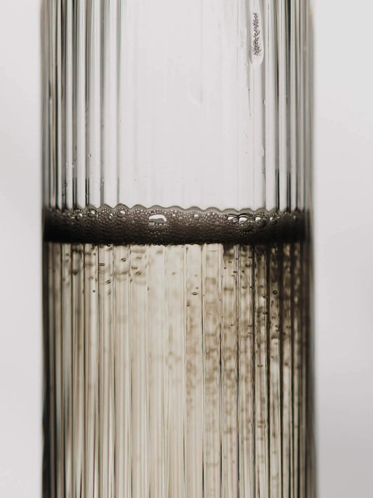 The Ripple Champagne Flutes bring a refined, elongated silhouette to the beloved Ripple series, perfectly suited for sparkling wines. Mouth-blown into the mould, each glass features the signature rippled surface that adds texture and a sense of movement. Their tall, slender shape enhances bubbles and aroma, making any toast feel celebratory.