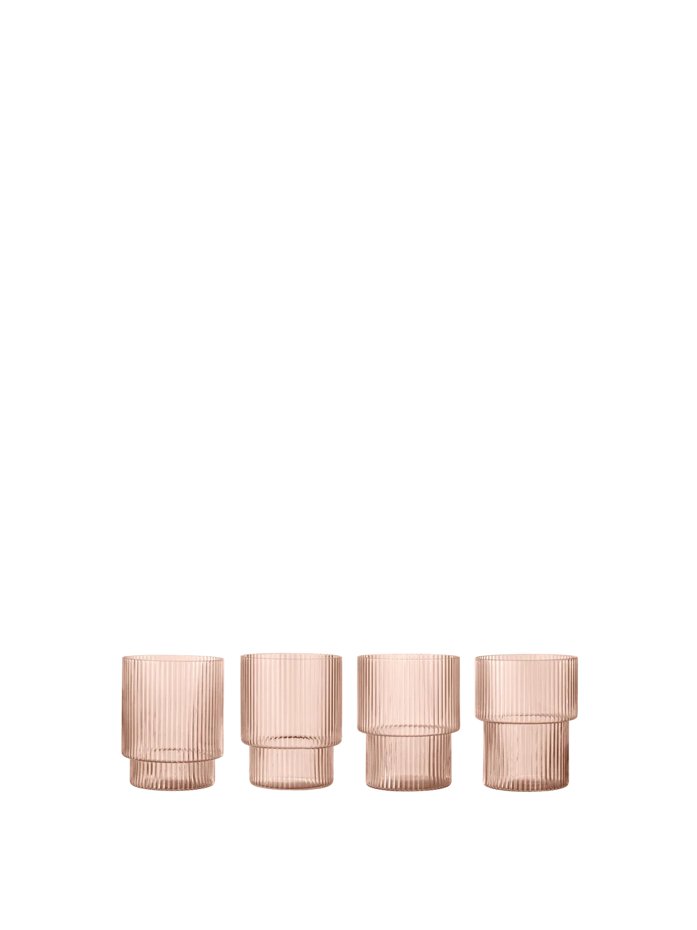Four ribbed glass tumblers in a translucent pale pink color, arranged in a row against a solid white background.