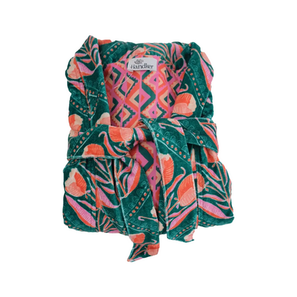 This duster coat is pure luxury, crafted of silky plush cotton velvet and smooth woven cotton on the reverse. We call this a duster because it can be worn as a robe or a coat--it even has pockets on both sides! This coat features a signature Handker hand-drawn pattern and is a cuddly hug no matter how you wear it.