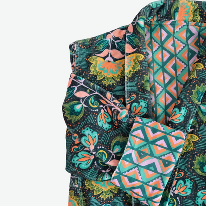 This duster coat is pure luxury, crafted of silky plush cotton velvet and smooth woven cotton on the reverse. We call this a duster because it can be worn as a robe or a coat--it even has pockets on both sides! This coat features a signature Handker hand-drawn pattern and is a cuddly hug no matter how you wear it.