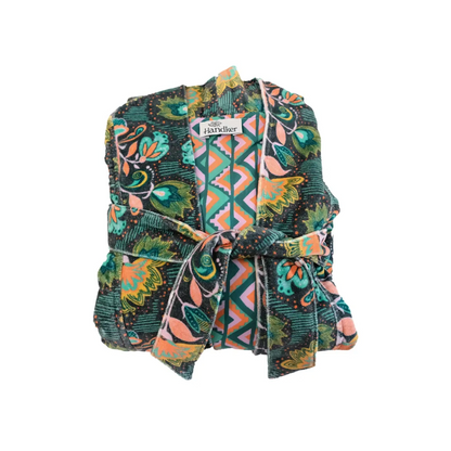 This duster coat is pure luxury, crafted of silky plush cotton velvet and smooth woven cotton on the reverse. We call this a duster because it can be worn as a robe or a coat--it even has pockets on both sides! This coat features a signature Handker hand-drawn pattern and is a cuddly hug no matter how you wear it.