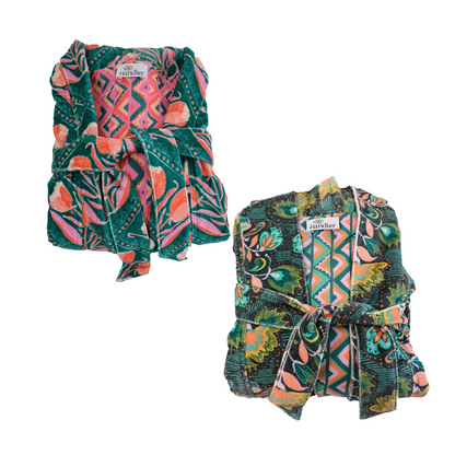 This duster coat is pure luxury, crafted of silky plush cotton velvet and smooth woven cotton on the reverse. We call this a duster because it can be worn as a robe or a coat--it even has pockets on both sides! This coat features a signature Handker hand-drawn pattern and is a cuddly hug no matter how you wear it.