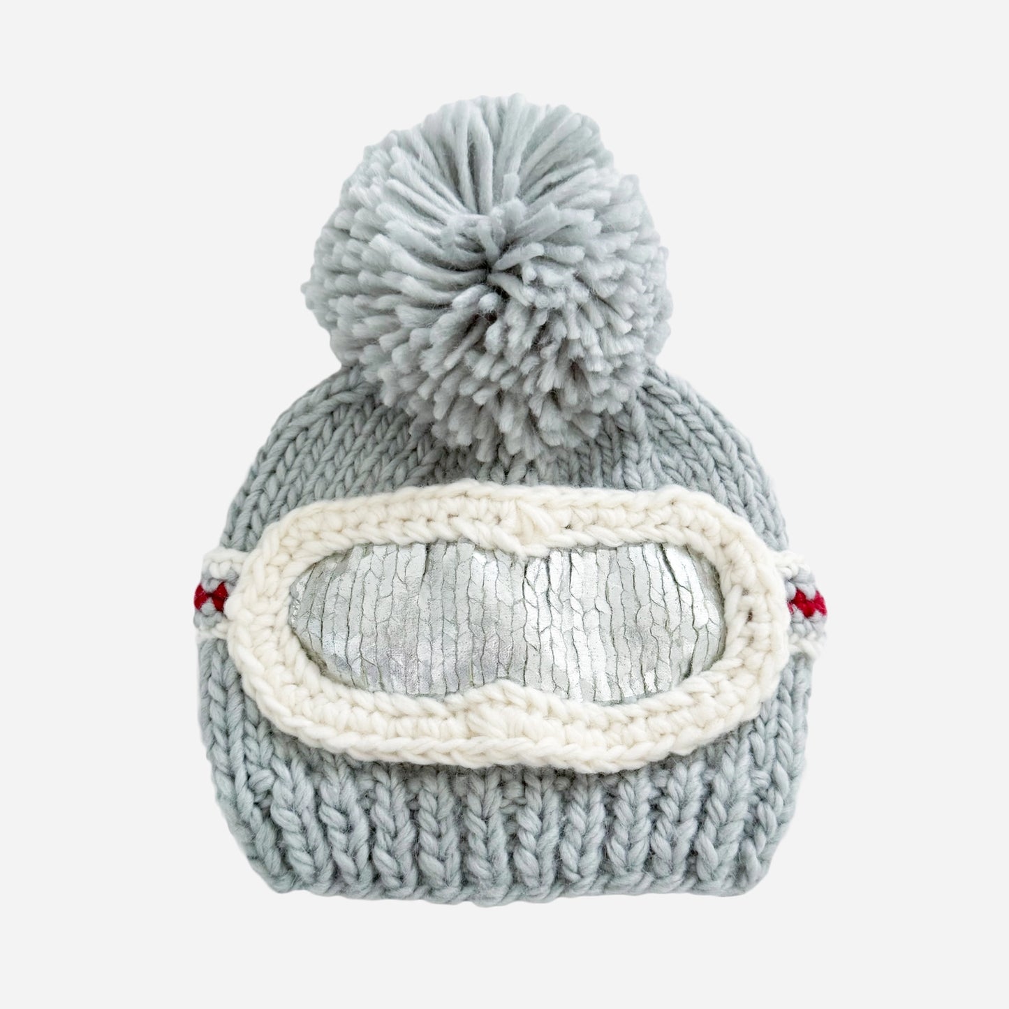 Gray knit beanie with pom-pom and goggles on a white background