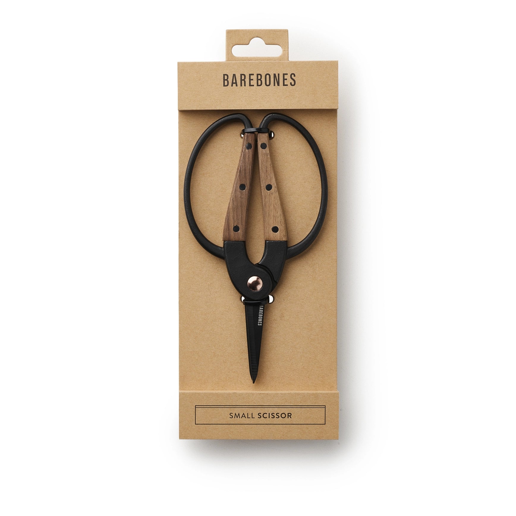 Small scissors with wooden handles in a Barebones packaging on a white background