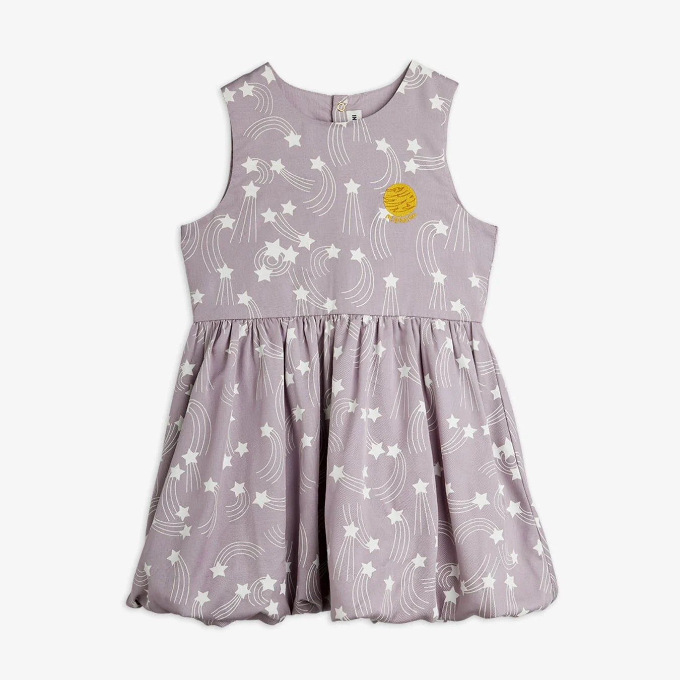 Sleeveless dress made from 100% lyocell. Features the Starfall print, a gathered skirt with bubble hem, and a small embroidered planet patch. Back neck keyhole with snap closure.