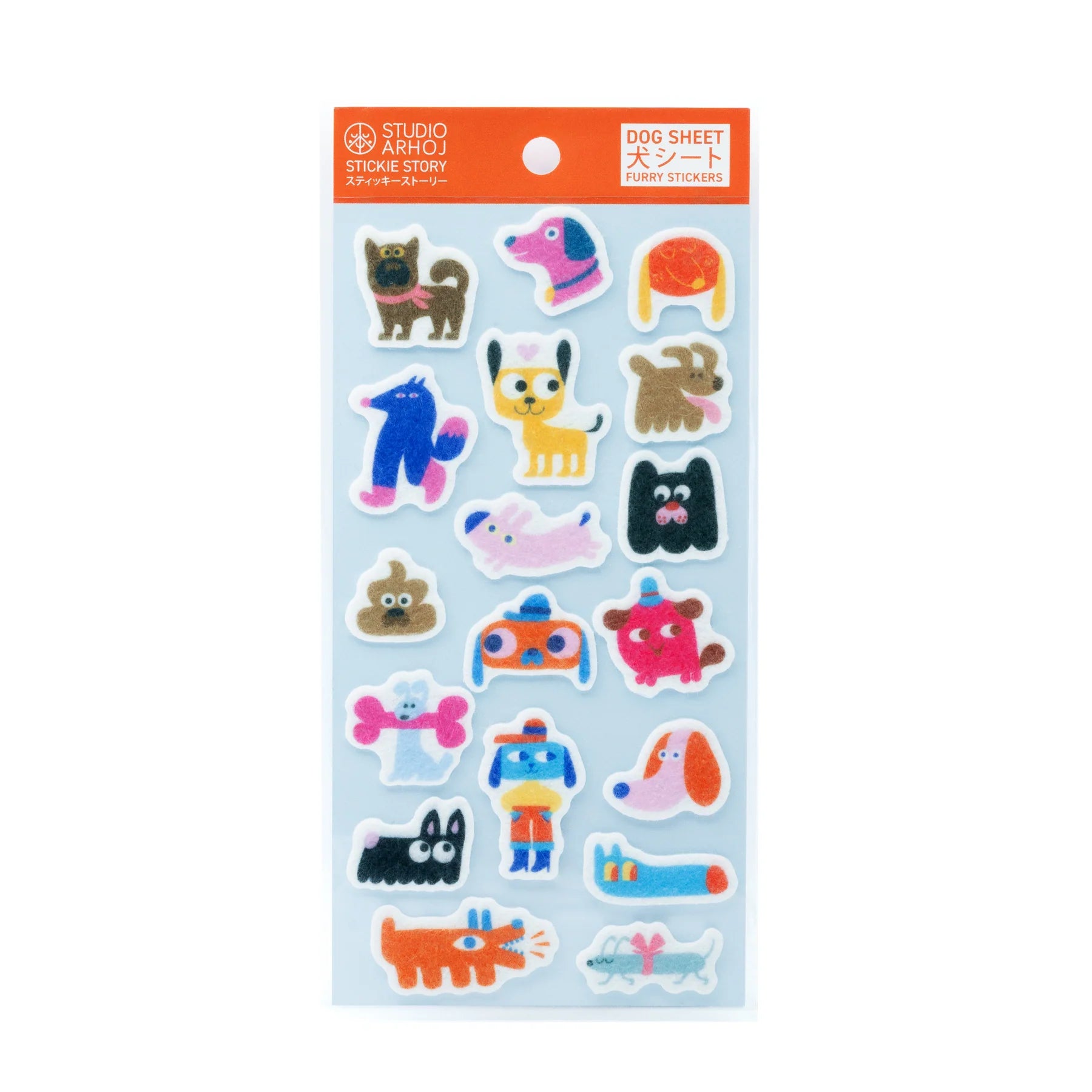 Studio Artoisan 'Dog Sheet' sticker pack featuring various colorful cartoon dog illustrations on a light blue backing sheet with an orange header card.