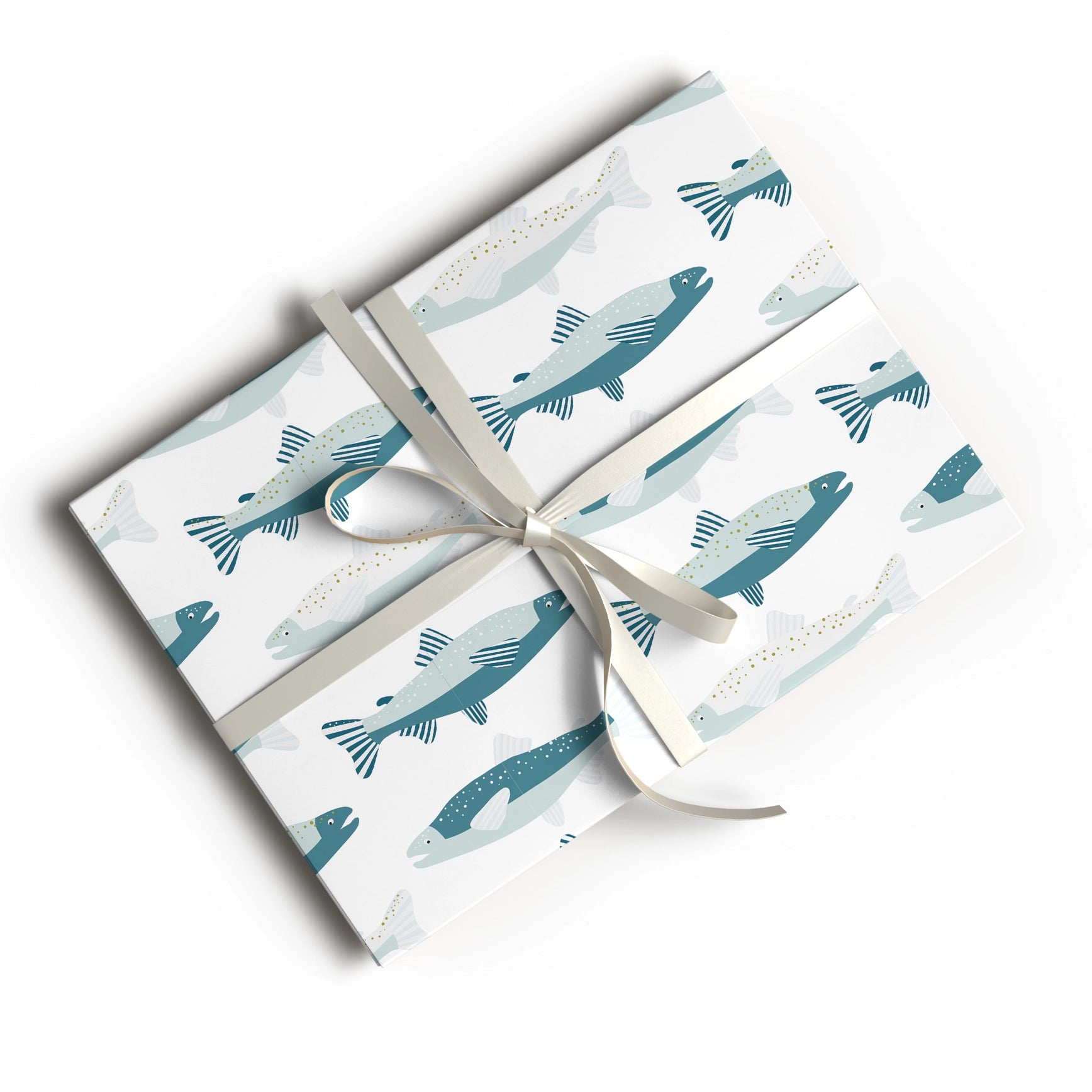 Three rectangular gift boxes wrapped in white paper printed with a repeating pattern of stylized fish in teal and pale blue, tied together with a white ribbon and bow on a light gray background.
