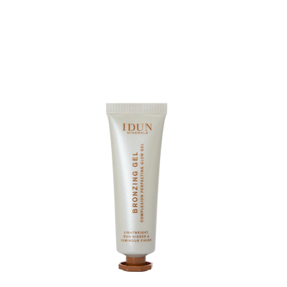IDUN Minerals bronzing gel tube on a white background, IDUN delivers affordable clean beauty for all. Their mission is to make sure everyone has access to great products that we put on our skin and keeping it vegan so it is cruelty free and safe for all skin types. Tested by dermatologists and ingredients so safe you could put it on a baby.