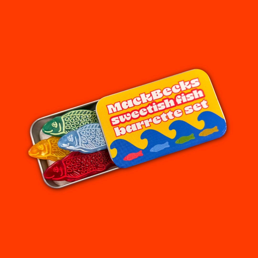MackBecks sweetish fish barrette set on an orange background