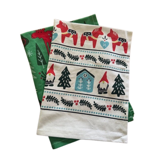 Set of three cotton towels with festive patterns reminiscant of Scandinavia. The Gnome, Dala Horse, Moose, Reindeers, and more all have Swedish workhorse quality. 