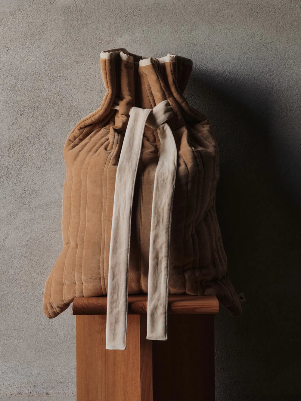 The Vari Quilted Sack is a spacious gift bag with a drawstring pull in soft earthy tones that will elevate your christmas or holiday gift giving or decor. They are found at Huset Shop in Venice Beach a Scandinavian Store. These are Danish holiday decor items