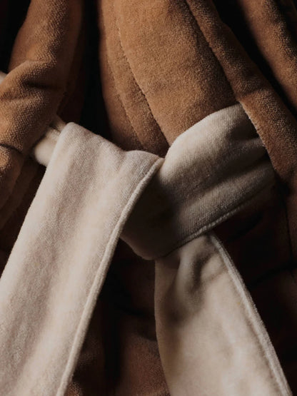 The Vari Quilted Sack is a spacious gift bag with a drawstring pull in soft earthy tones that will elevate your christmas or holiday gift giving or decor. They are found at Huset Shop in Venice Beach a Scandinavian Store. These are Danish holiday decor items