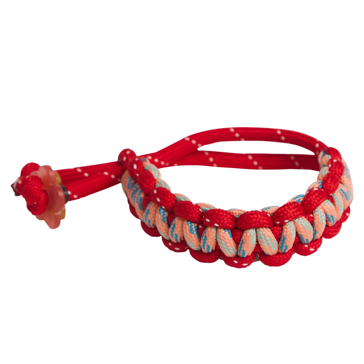 Red braided bracelet with a knot on a white background