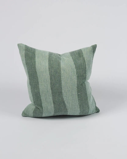 Green striped pillow on a white background