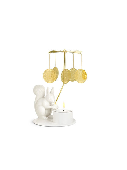Made in Denmark the Squirrel with its angel chime brings playful light patterns into your living room. It is a cheerful and magical tale which will bring you warm and friendly companionship in the long, cosy days of winter. A decorate item without sound. Use tealights.
