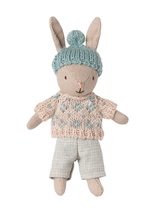 Let the storytelling and hours of play begin with this soft rabbit. It fits Maileg accessories in size micro perfectly and can live in the miniature dollhouse. This rabbit size is also perfect on the go so you can bring the magic&nbsp;everywhere. The cozy clothing is perfect for bringing them outside because they are dressed for the harsh weather.