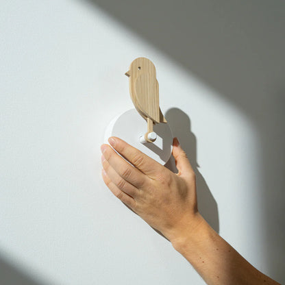 When air quality is poor, Birdie® will drop down when the level of CO2 is higher than 1.000 ppm for more than 10 minutes. When the level of CO2 drops below 800 ppm again the Birdie will return to standing position. It's very important to get airflow when you ventilate your home - you can get optimal airflow by opening multiple windows at once. Danish Health Authorities recommend ventilating for 5-10 minutes 2-3 times a day. Something that is very easy to forget to do. Unlike other air quality monitors, Bird