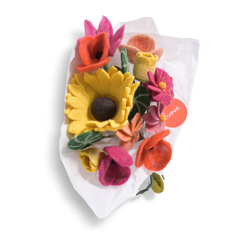 Aveva Wool Flower Bouquets that spark joy and will last you a lifetime. No more having to re buy flowers to fill the empty vases around your home, you can bring a touch of nature inside with colorful bouquets made with sustainable wool. This is the Amsterdam bouquet with a large sunflower and pink, yellow, and green hues.