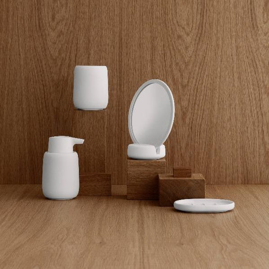 Soap Dispenser - SONO is just one available design in the blomus SONO bath line which features gentle shapes, perfectly rounded edges and a soft surface with an exquisite silk matte finish. The SONO range includes a soap dispenser, soap dish, tumbler, tray, storage box, vanity mirror, pedal bin waste basket, squeegee and toilet brush in a variety of colors including:&nbsp;Micro Chip (grey), White, Black, Moonbeam (beige), Satellite (taupe), Magnet (charcoal), and Tan.